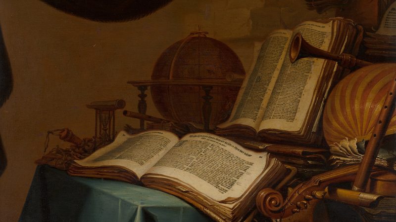 Ancient books, a globe, and historical flutes representing the preservation of the world's flute heritage and musical history.